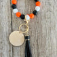 Orange Black and White Wristlet